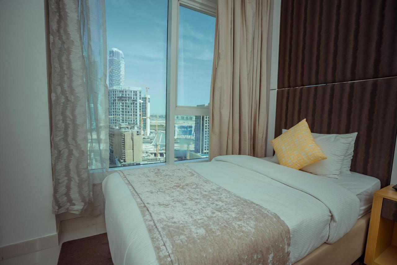 Oskena Vacation Homes - Waterfront Downtown ドバイ エクステリア 写真